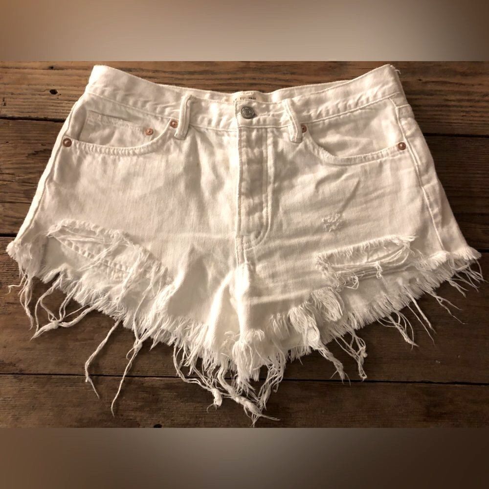 We the free white distressed denim cut off size 27